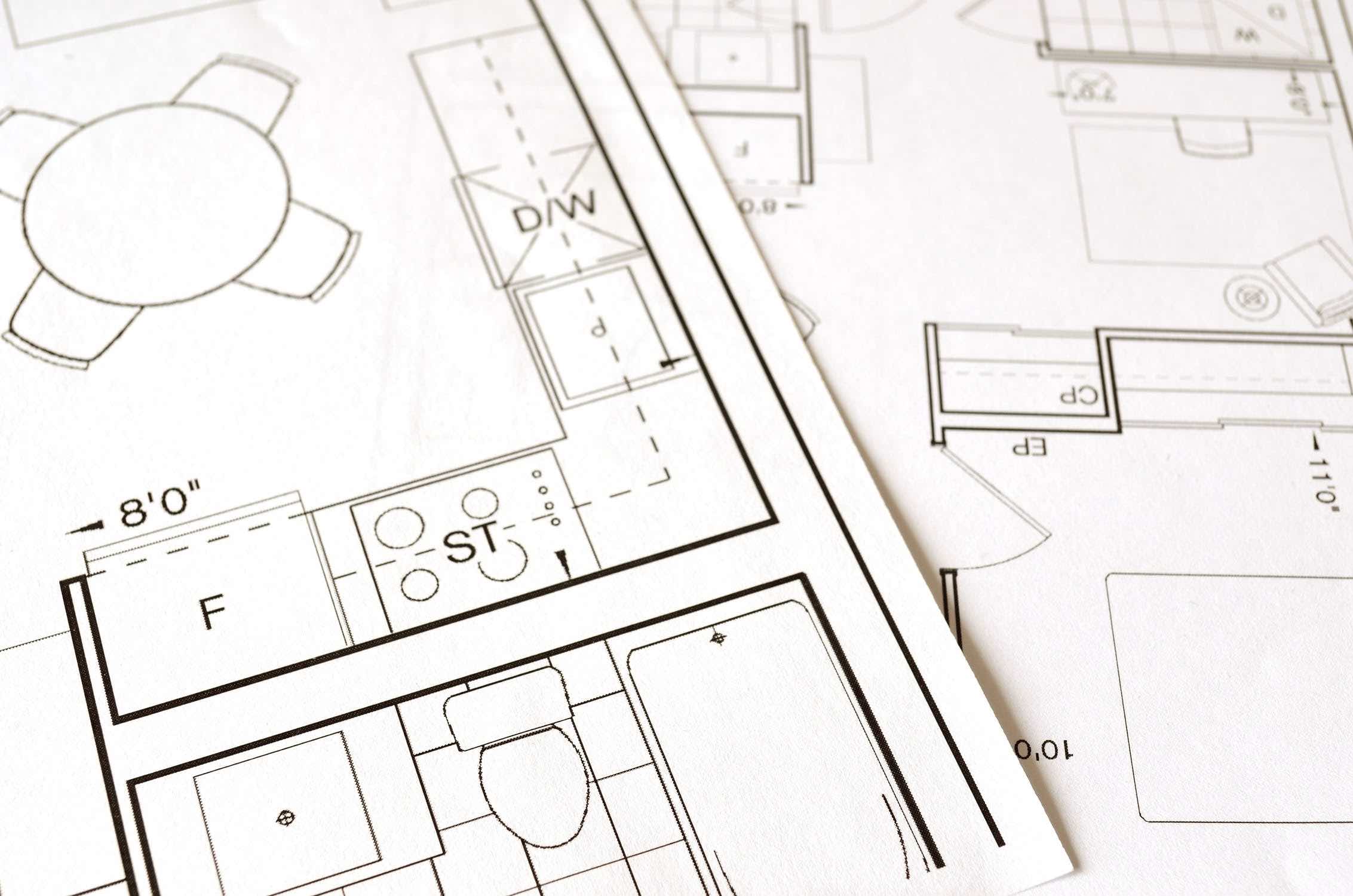 blueprints for a house drawn with pencil on white paper